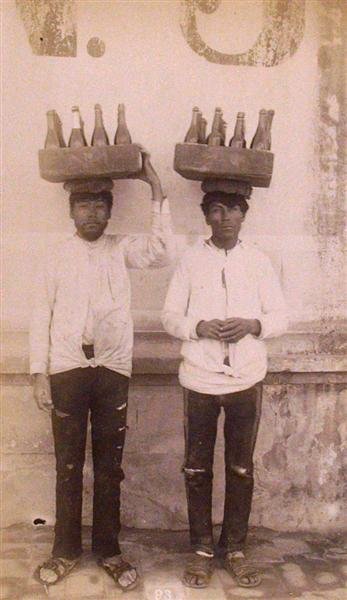OTIS M. GOVE (American) Vintage albumen print: Otis M. Gove (American, 1851 - 1931). "Native Wine Carriers [Mexico]". Vintage albumen print. c1880. Printed 1880. Numbered 93 in negative. 7 9/16 x 4 7/16 in. (192 x 113 mm). [22966]