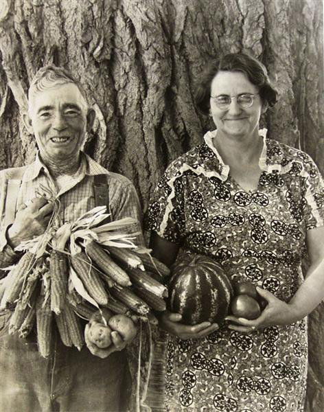 ARTHUR ROTHSTEIN (American) Gelatin silver print: Arthur Rothstein (American, 1915 - 1985). "Farmer and Wife, Colorado". Gelatin silver print. 1939. Printed later. Stamp titled, numbered, dated and annotated, verso. 9 3/8 x 7 1/2 in. (238 x 190 mm).