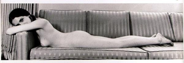 MARTIN H. MILLER (American) Vintage gelatin silver: Martin H. Miller (American, 1917 - 2005). "Reclining Nude on Striped Couch". Vintage gelatin silver print. 1960s-70s. Printed 1960s-70s. Photographer's stamp, verso. PSA Journal stamp on verso. 4 3/8 