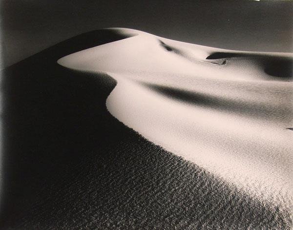 HARRY VROMAN (American) Vintage gelatin silver pr: Harry Vroman (American, 1889 - 1983). "Shadowy Dune, White Sands, New Mexico". Vintage gelatin silver print. c1930s. Printed c1930s. Photographer's stamp, verso. 10 15/16 x 13 7/8 in. (278 x 352 mm). 