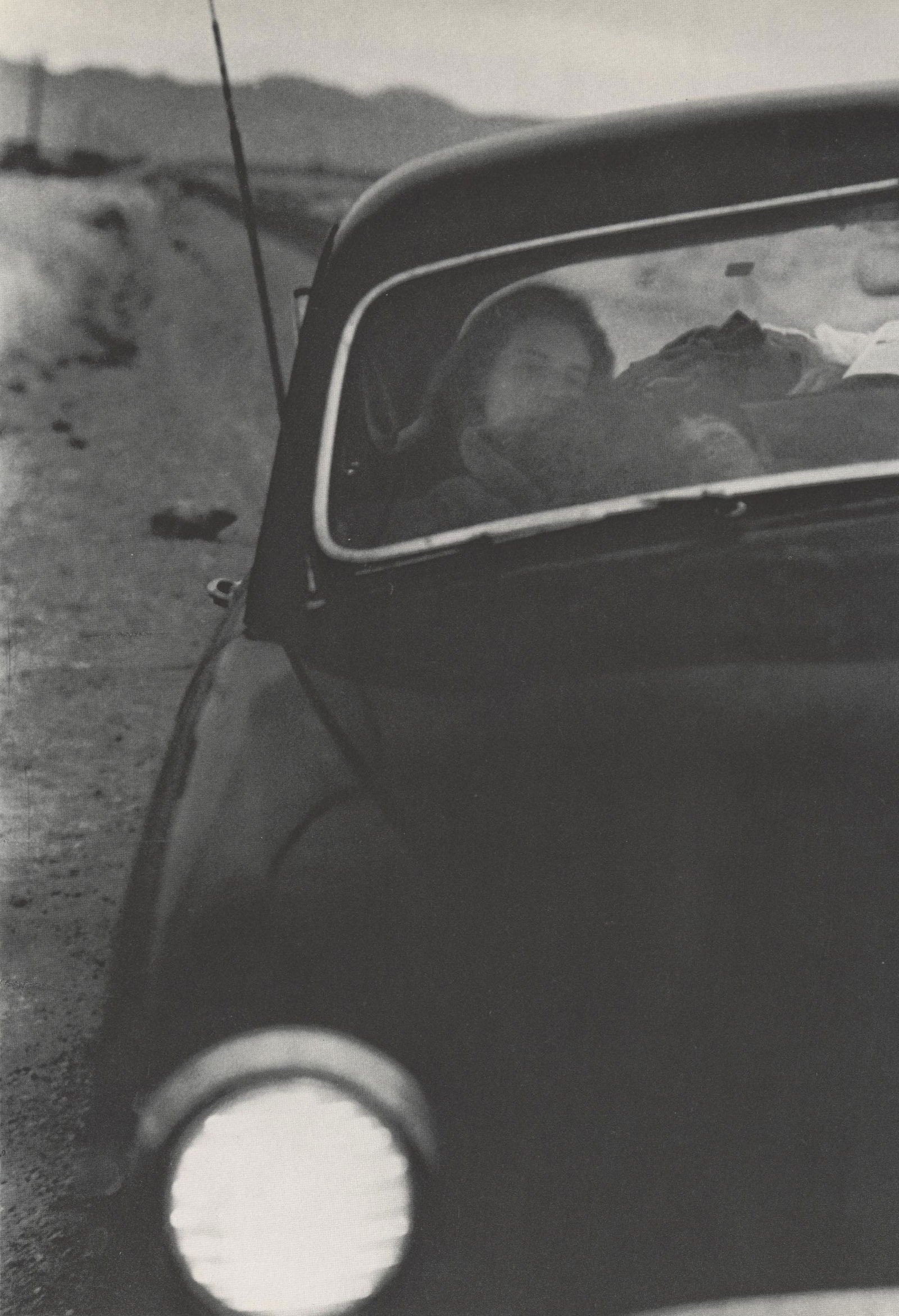 ROBERT FRANK - U.S. 90, En Route to Del Rio, Texas -: Artist: Robert Frank (Swiss/American, b.1924). Title: "U.S. 90, En Route to Del Rio, Texas". Medium: Original photogravure. Date: Composed 1956. Printed 1969. Dimensions: Overall size: 6 5/8