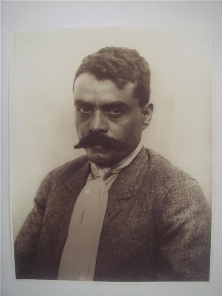 AUGUSTIN VICTOR CASASOLA (Mexican) Gelatin silver : Augustin Victor Casasola (Mexican, 1874 - 1938). "Emiliano Zapata (Retrato Rostro) [Mexico]". Gelatin silver print. c1910. Printed later from the original negative. Casasola Studios embossed blindstam