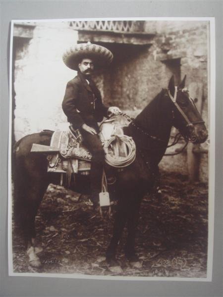 AUGUSTIN VICTOR CASASOLA (Mexican) Gelatin silver : Augustin Victor Casasola (Mexican, 1874 - 1938). "Emiliano Zapata en Su Caballo 'As de Oros' [Mexico]". Gelatin silver print. c1910. Printed later from the original negative. Casasola Studios embossed