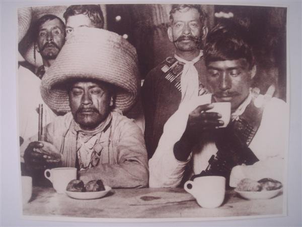 AUGUSTIN VICTOR CASASOLA (Mexican) Gelatin silver : Augustin Victor Casasola (Mexican, 1874 - 1938). "Zapatistas en Sanborns [Mexico]". Gelatin silver print. c1914. Printed later from the original negative. Casasola Studios embossed blindstamp seal, lo
