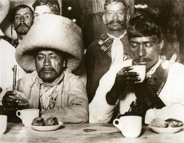 AUGUSTIN VICTOR CASASOLA (Mexican) Gelatin silver : Augustin Victor Casasola (Mexican, 1874 - 1938). "Zapatistas en Sanborns [Mexico]". Gelatin silver print. c1914. Printed later from the original negative. Casasola Studios embossed blindstamp seal, lo