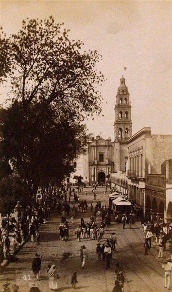 OTIS M. GOVE (American) Vintage albumen print: Otis M. Gove (American, 1851 - 1931). "Street Scene in Leon [Mexico]". Vintage albumen print. c1880. Printed 1880. Numbered 41 in negative. 7 3/8 x 4 7/16 in. (187 x 113 mm). [22941]