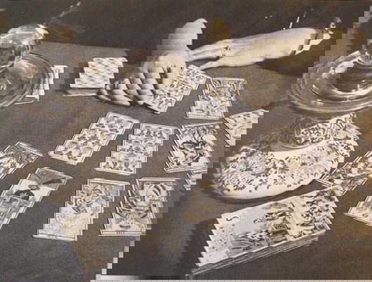 BRASSAI [GYULA HALASZ] (Hungarian/French) Original: Brassai [Gyula Halasz] (Hungarian/French, 1899-1984). "Tarots". Original vintage photogravure. c1935. Printed 1938. 6 9/16 x 8 3/4 in. (167 x 222 mm). [23549]