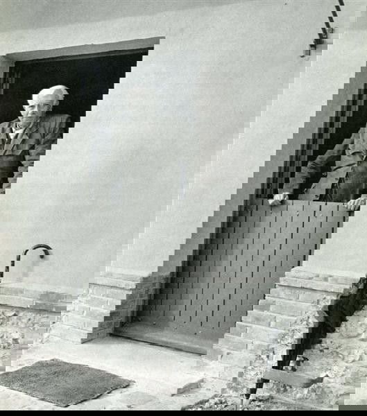 ROBERT DOISNEAU (French) Original vintage photogra: Robert Doisneau (French, 1912-1994). "Braque et Parapluie". Original vintage photogravure. 1953. Printed 1953. 7 1/4 x 6 3/8 in. (184 x 162 mm). [24881]