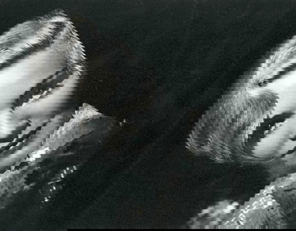 GEORGE HURRELL (American) Original vintage photogr: George Hurrell (American, 1904 - 1992). "Portrait of Madeline Caroll". Original vintage photogravure. c1938. Printed 1938. 9 7/16 x 7 1/2 in. (240 x 190 mm). [24169]