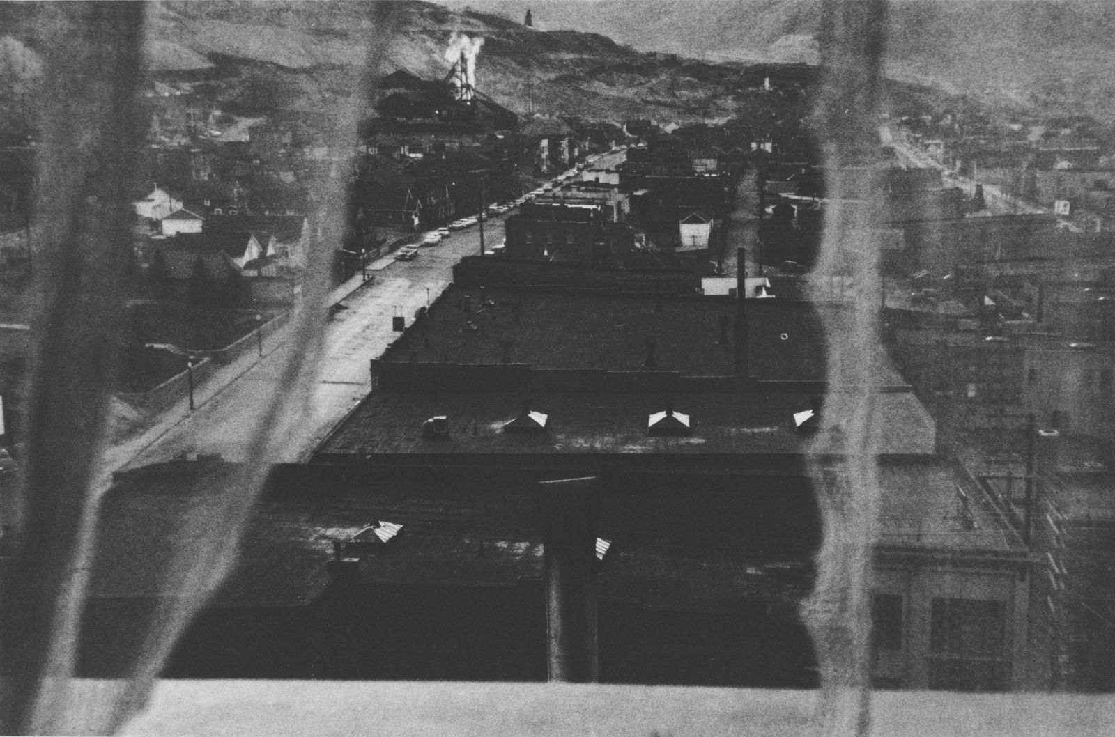 ROBERT FRANK - View from Hotel Window, Butte, Montana - Original photogravure: Artist: Robert Frank (Swiss/American, b.1924). Title: "View from Hotel Window, Butte, Montana". Medium: Original photogravure. Date: Composed 1956. Printed 1969. Dimensions: Overall size: 5 x