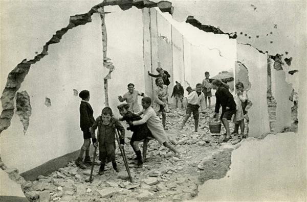 HENRI CARTIER-BRESSON - Original vintage photograv: Henri Cartier-Bresson (French, 1908 - 2004). "Seville". Original vintage photogravure. 1933. Printed 1953. 6 5/8 x 10 in. (168 x 254 mm). [25072]