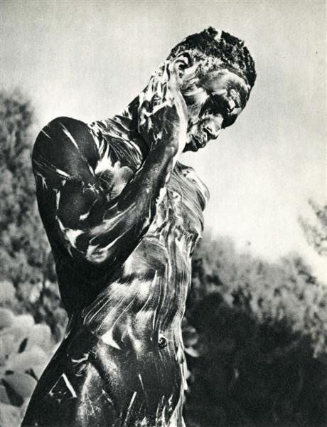 HERBERT LIST - Original vintage photogravure: Herbert List (German, 1903-1974). "Nude Black Male Soaping Himself". Original vintage photogravure. c1934. Printed 1935. 8 5/8 x 6 5/8 in. (219 x 168 mm). [24161]