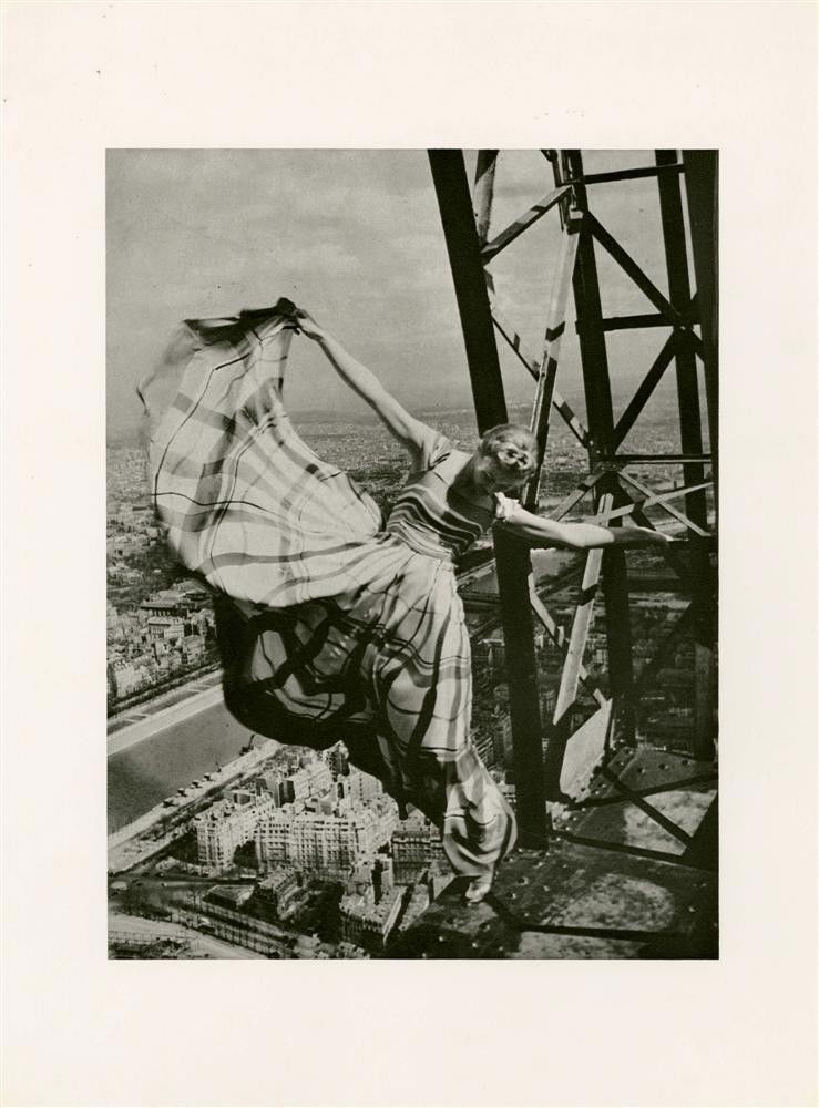 ERWIN BLUMENFELD - Original photogravure: Erwin Blumenfeld (German-American, 1897-1969). "Lisa Fonssagrives on the Eiffel Tower, dress by Lelong". Original photogravure. 1939. Printed later. Fine condition. Image size: 11 1/2 x 8 5/8 in. (292