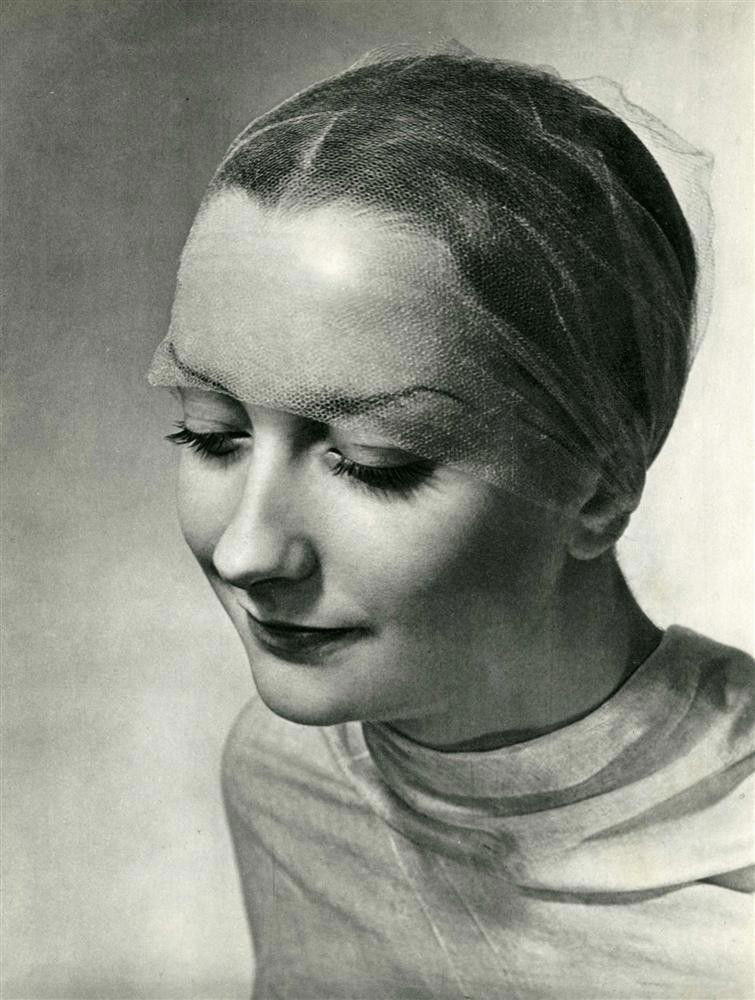 ERWIN BLUMENFELD - Original vintage photogravure: Erwin Blumenfeld (German-American, 1897-1969). "Young Woman Smiling". Original vintage photogravure. c1937. Printed 1937. Image size: 11 3/16 x 8 7/16 in. (284 x 214 mm). [23894]