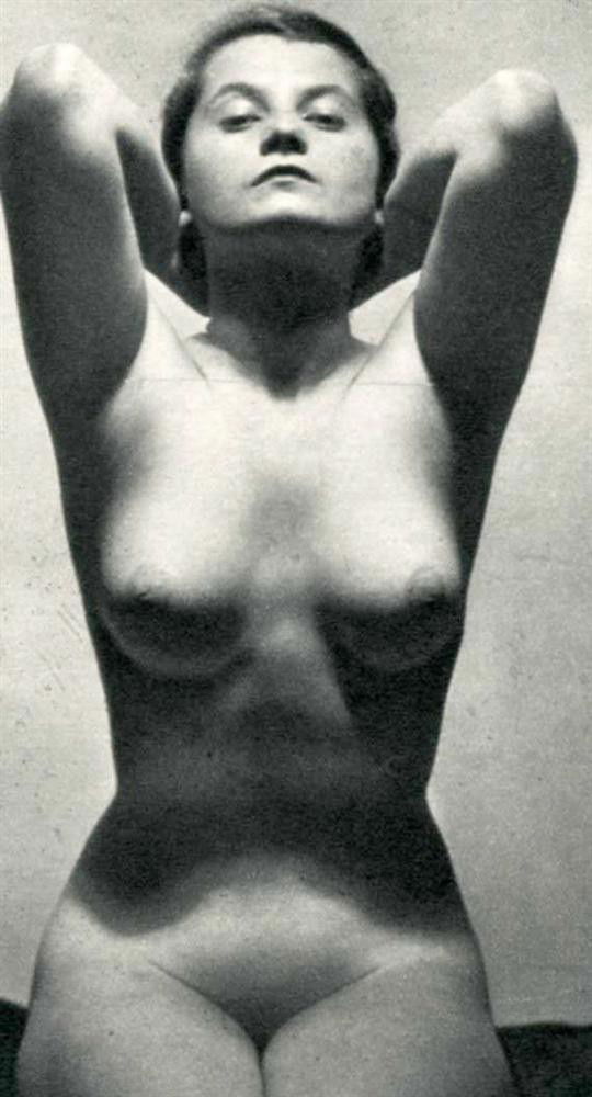 FRANTISEK DRTIKOL - Original vintage photogravure: Frantisek Drtikol (Czech, 1883 - 1961). "Femme Nu #020". Original vintage photogravure. c1935. Printed 1935. Image size: 3 11/16 x 2 3/16 in. (94 x 56 mm). [22628]