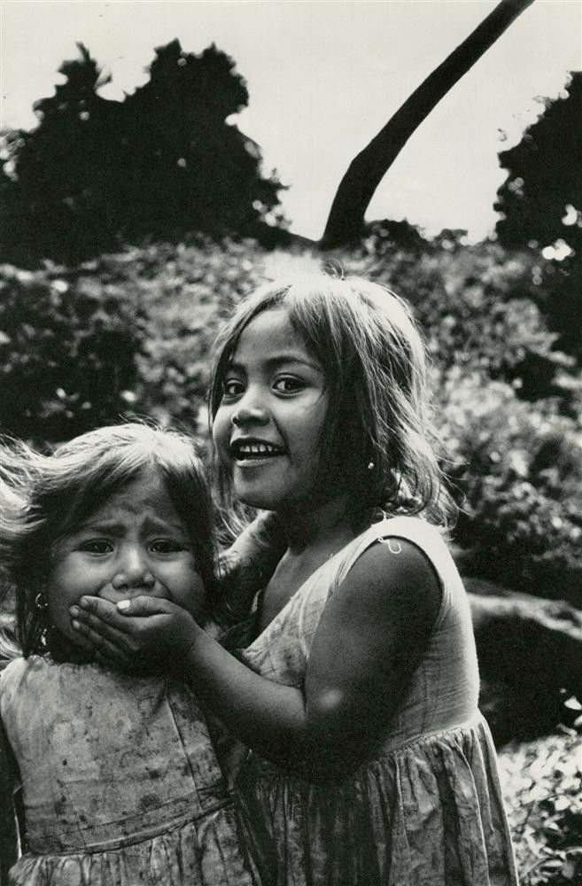 MARY ELLEN MARK - Original vintage photogravure: Mary Ellen Mark (American, b.1940). "Hush!". Original vintage photogravure. c.1967. Printed 1969. Fine condition. Image size: 13 x 8 3/4 in. (330 x 222 mm). [25460] {R100}