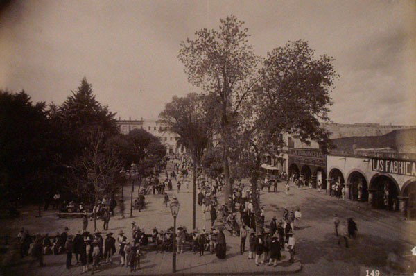 OTIS M. GOVE - Vintage albumen print: Otis M. Gove (American, 1851 - 1931). "Scene in the Plaza at Leon [Mexico]". Vintage albumen print. c1880. Printed 1880. Numbered 149 in negative. Image size: 6 3/16 x 9 1/2 in. (157 x 241 mm). [22832