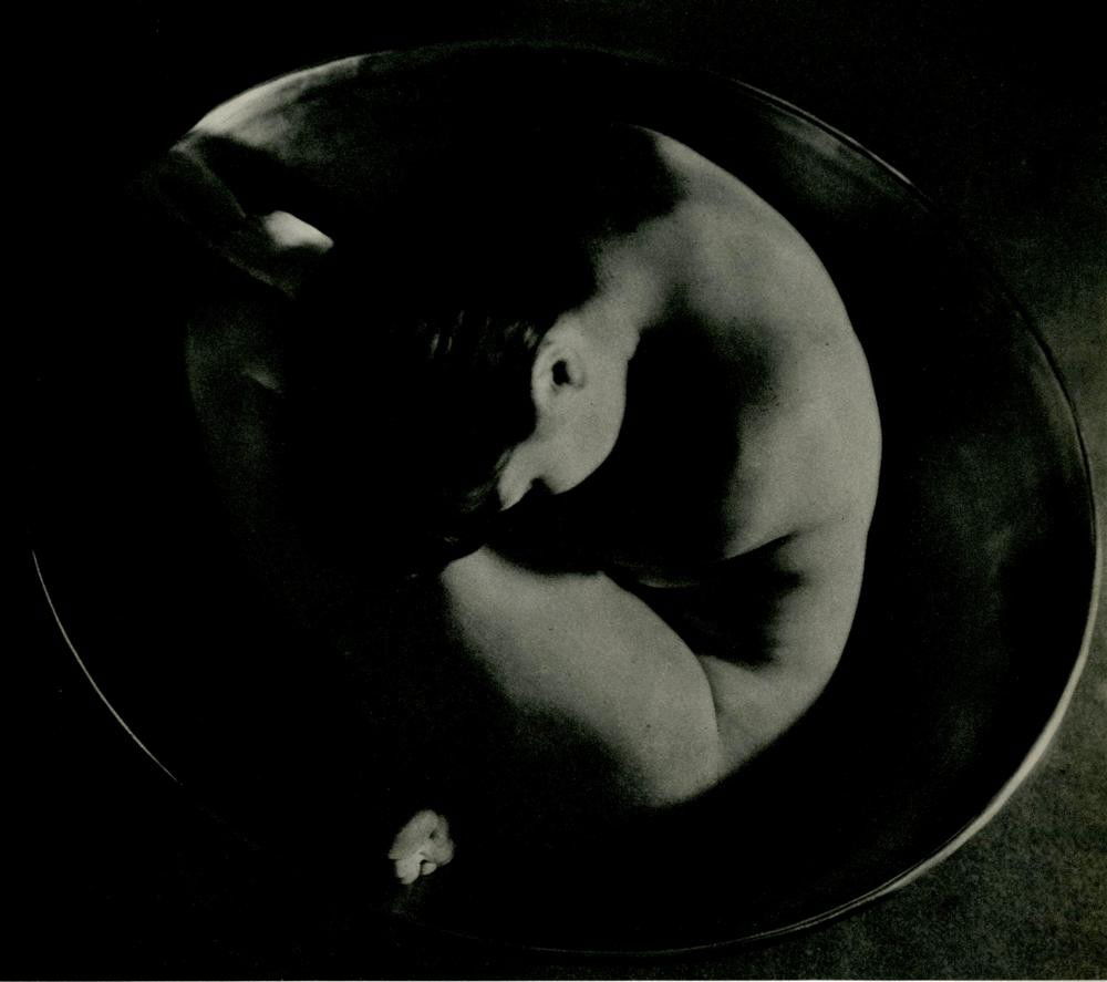 RUTH BERNHARD - Original vintage photogravure: Ruth Bernhard (American, 1905-2006). "Nude Study #143". Original vintage photogravure. c1935. Printed 1936. Very good condition. Image size: 6 13/16 x 7 3/4 in. (173 x 197 mm). Starting bid $400. [257