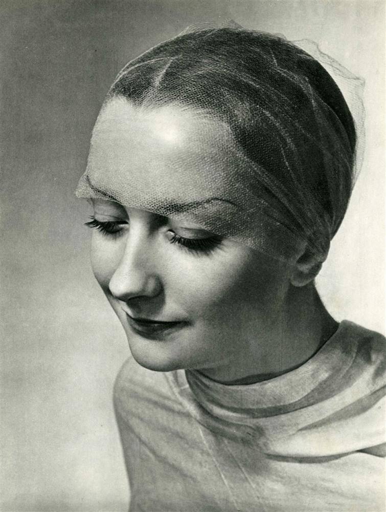 ERWIN BLUMENFELD - Original vintage photogravure: Erwin Blumenfeld (German-American, 1897-1969). "Young Woman Smiling". Original vintage photogravure. c1937. Printed 1937. Image size: 11 3/16 x 8 7/16 in. (284 x 214 mm). Starting bid $250. [23894] {R