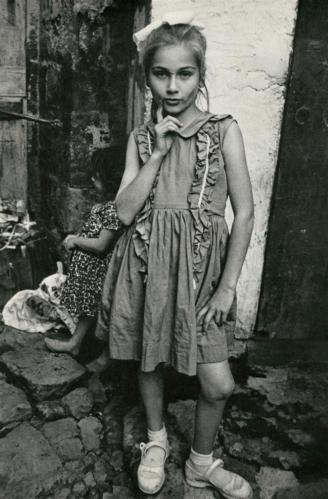 MARY ELLEN MARK - Original vintage photogravure: Mary Ellen Mark (American, b.1940). "Pensive". Original vintage photogravure. c.1964. Printed 1969. Fine condition. Image size: 13 x 8 3/4 in. (330 x 222 mm). Starting bid $400. [25459] {R100}