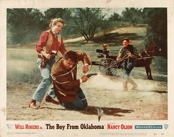 WARNER BROS - Original color movie posters: Warner Bros (American, 20th Century). "Group of 4 Prints". Original color movie posters. 1954. * The Boy From Oklahoma [No. 5]. Color collotype (movie poster). 1954. 9 x 12 7/8 in. (229 x 327 mm). She