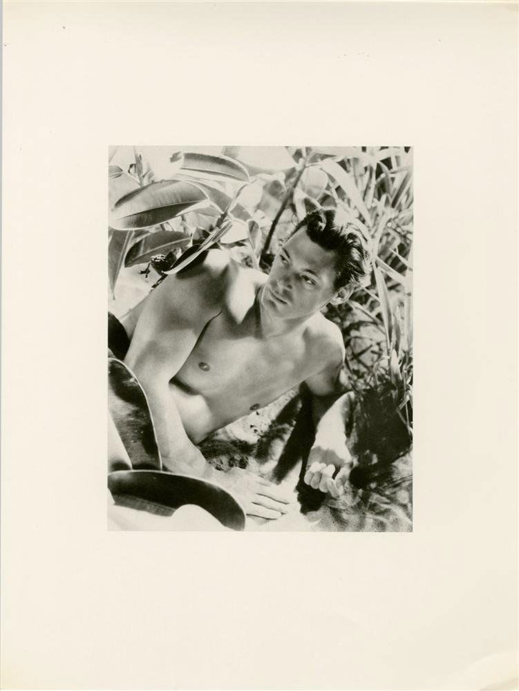CECIL BEATON - Original photogravure: Cecil Beaton (English, 1904 - 1980). "Johnny Weissmuller". Original photogravure. 1933. Printed later. Very good condition, with tissue guard. Image size: 8 11/16 x 6 7/8 in. (221 x 175 mm). Sheet siz