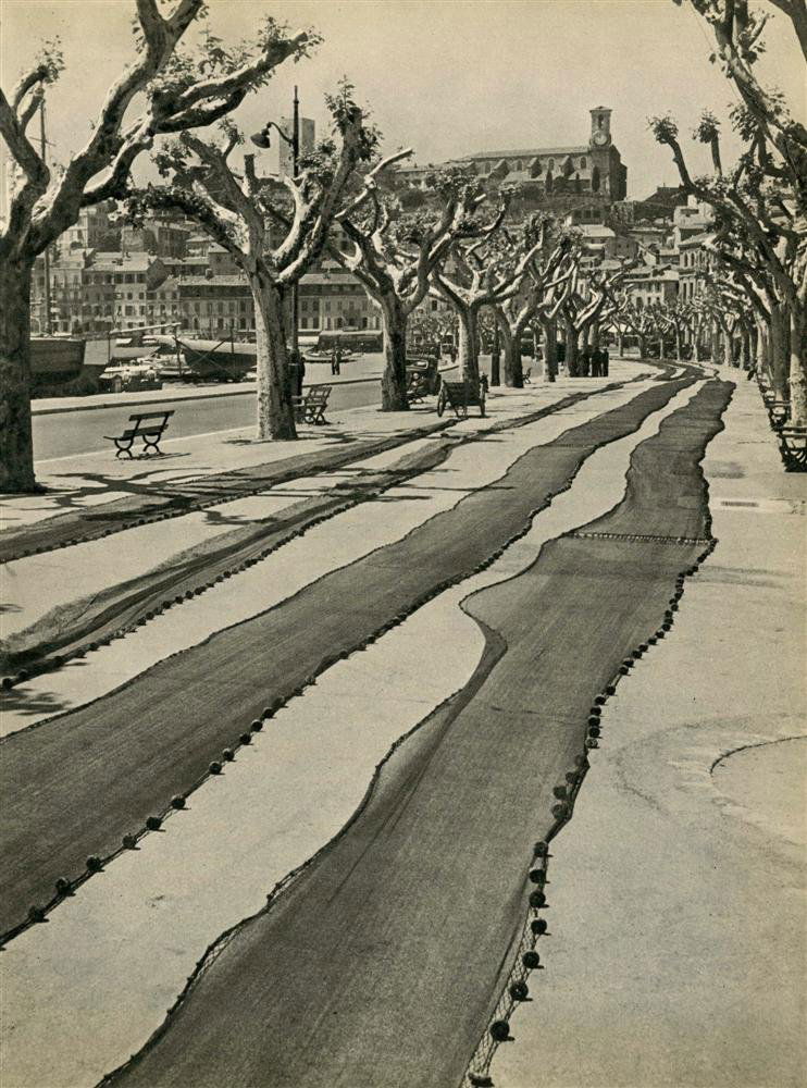 BRASSAI [GYULA HALASZ] - Original vintage photogra: Brassai [Gyula Halasz] (Hungarian/French, 1899-1984). "Filets des Pecheurs". Original vintage photogravure. c1948. Printed 1948. Image size: 11 x 8 3/16 in. (279 x 208 mm). [24891] {R100}