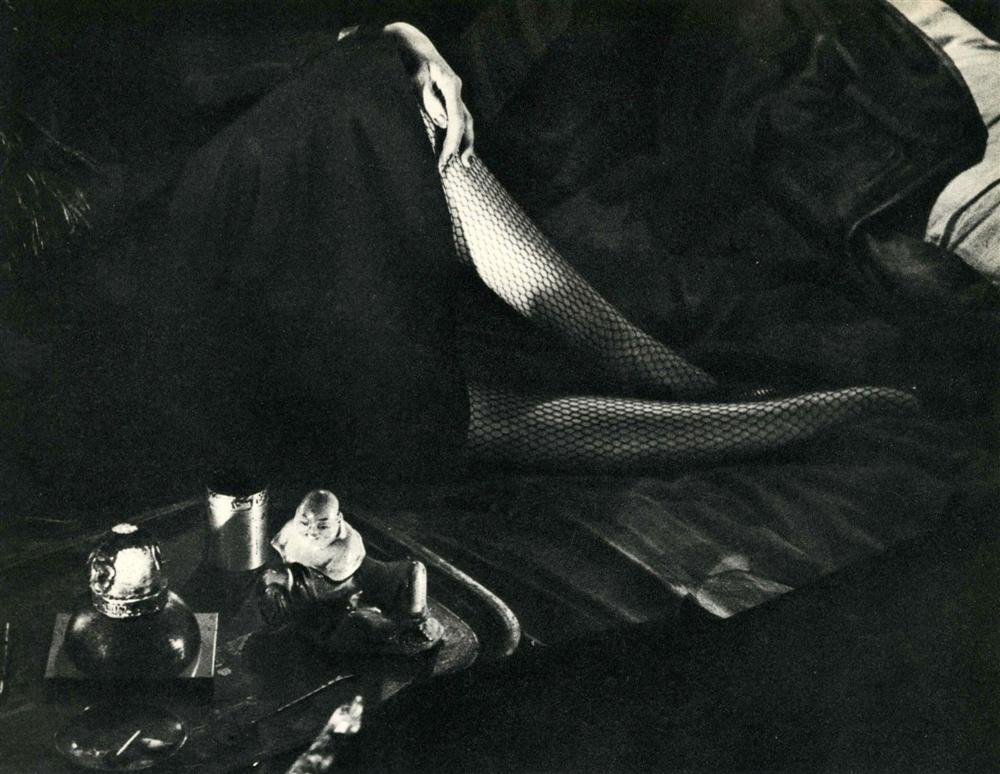 BRASSAI [GYULA HALASZ] - Original vintage photogra: Brassai [Gyula Halasz] (Hungarian/French, 1899-1984). "Repaire d'Opium". Original vintage photogravure. c1931-1932. Printed 1933. Image size: 7 3/16 x 9 1/8 in. (183 x 232 mm). [23948] {R100}