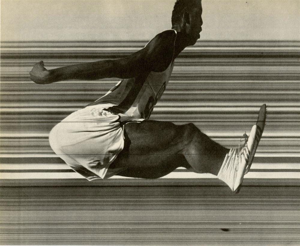 GEORGE SILK - Original vintage magnagravure: George Silk (New Zealander/American, 1916-2004). "Broad Jumper". Original vintage magnagravure. c1961. Printed 1962. Very good condition. Image size: 6 3/8 x 7 3/4 in. (162 x 197 mm). [25924] {R100}