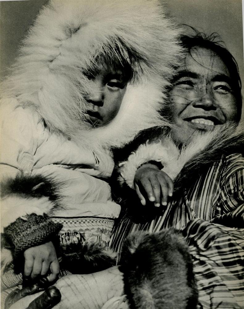 MARGARET BOURKE-WHITE - Original vintage photograv: Margaret Bourke-White (American, 1904 - 1971). "Arctic Madonna, Coppermine, NWT, Canada". Original vintage photogravure. c1938. Printed 1939. Very good condition. Image size: 10 5/8 x 8 1/4 in. (270 x