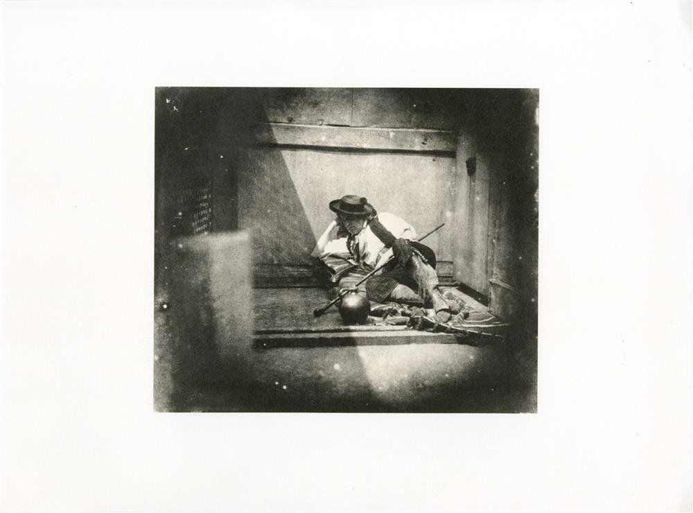 WILLIAM HENRY FOX TALBOT - Original photogravure: William Henry Fox Talbot (English, 1800-1877). "Man in Spanish Costume". Original photogravure. c1840s?. Printed later from the original photograph. Fine condition. Image size: 7 3/8 x 8 11/16 in. (18