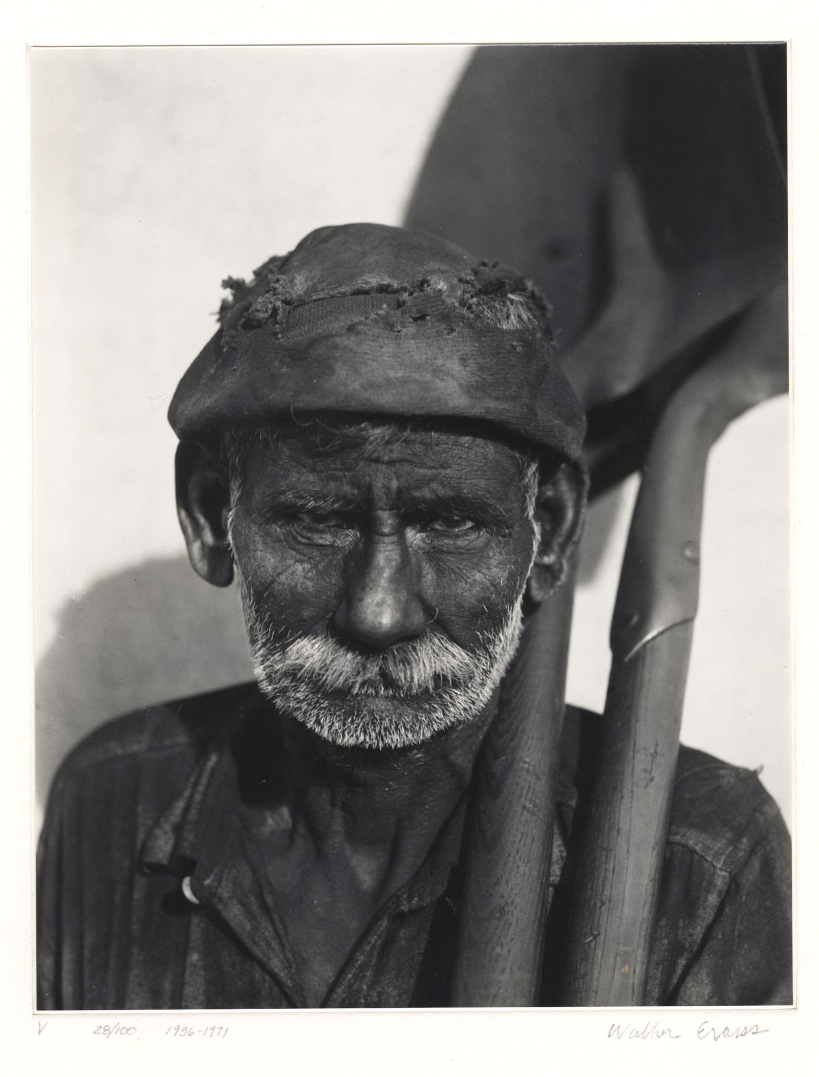 WALKER EVANS - Coal Dock Worker, Havana, Cuba - Gelatin silver print: Artist: Walker Evans (American, 1903 - 1975). Title: "Coal Dock Worker, Havana, Cuba [two shovels]". Medium: Gelatin silver print. Date: Composed 1932. Printed 1971. Dimensions: Overall size: