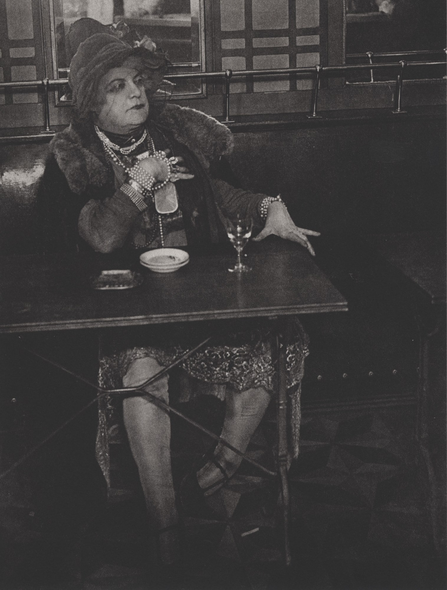 BRASSAI [gyula halasz] - La Môme Bijou, Bar de la Lune, Montmarte - Original photogravure: Artist: Brassai [gyula halasz] (Hungarian/French, 1899-1984). Title: "La Môme Bijou, Bar de la Lune, Montmarte". Medium: Original photogravure. Date: Composed c1932. Printed later. Dimension