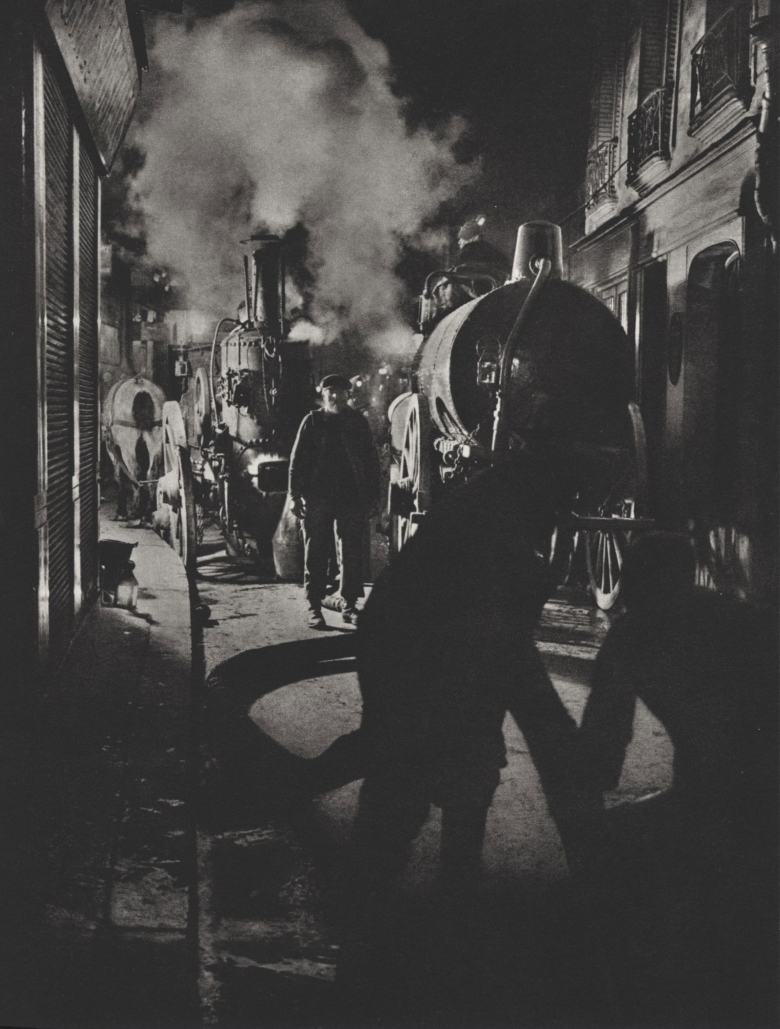 BRASSAI [gyula halasz] - Les vidangeurs activant la pompe, rue Rambuteau - Original photogravure: Artist: Brassai [gyula halasz] (Hungarian/French, 1899-1984). Title: "Les vidangeurs activant la pompe, rue Rambuteau". Medium: Original photogravure. Date: Composed c1932. Printed later. Dimensi