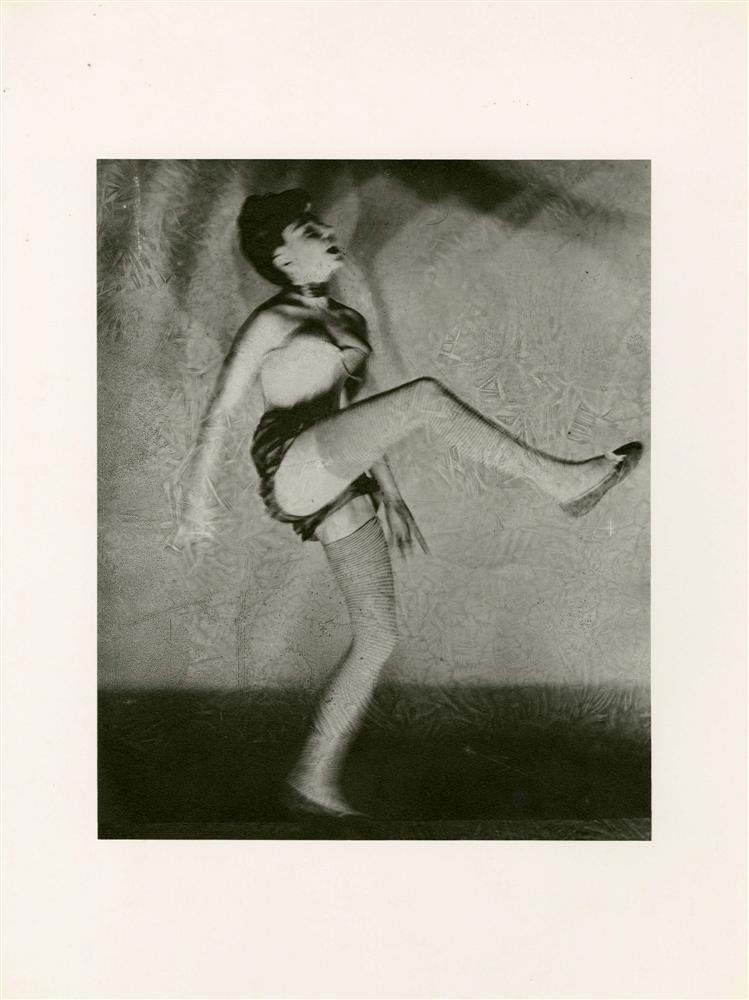 ERWIN BLUMENFELD - Original photogravure: Erwin Blumenfeld (German-American, 1897-1969). "Can-Can Dancer, New York City". Original photogravure. 1943. Printed later. Fine condition. Overall size: 15 3/4 x 11 13/16 in. (400 x 300 mm). Image si