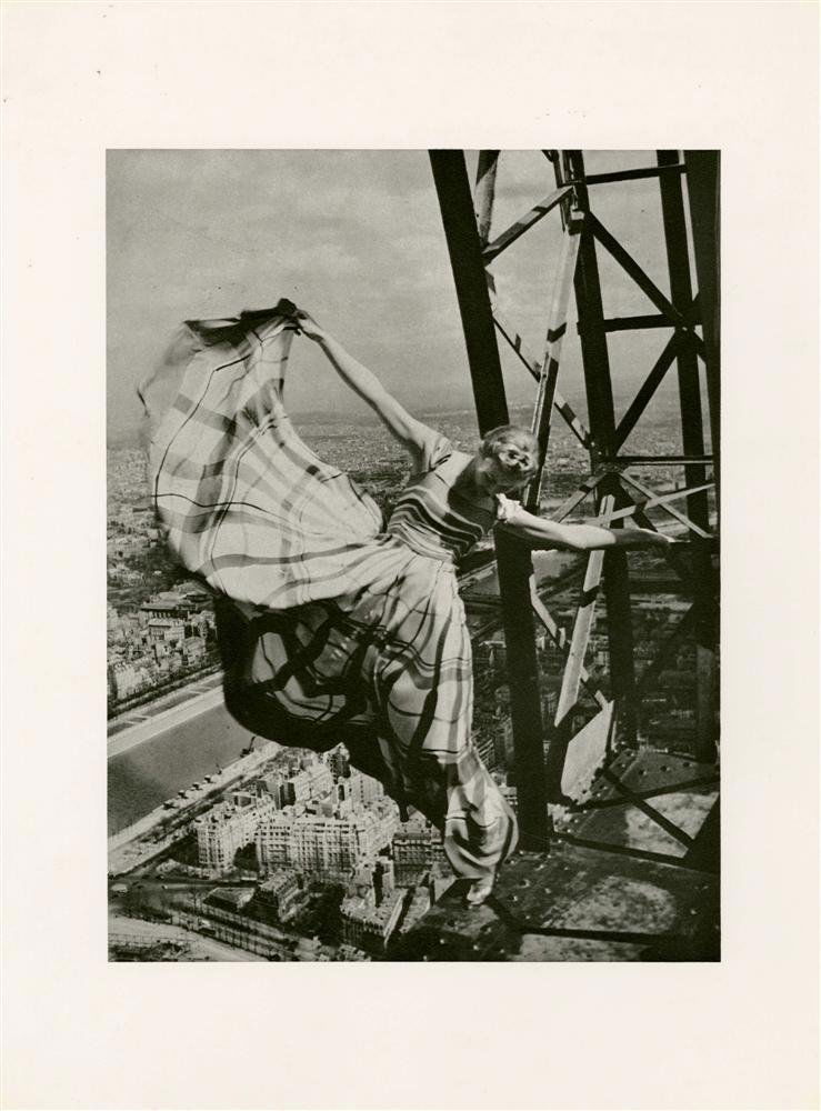 ERWIN BLUMENFELD - Original photogravure: Erwin Blumenfeld (German-American, 1897-1969). "Lisa Fonssagrives on the Eiffel Tower, dress by Lelong". Original photogravure. 1939. Printed later. Fine condition. Overall size: 15 3/4 x 11 13/16 in.
