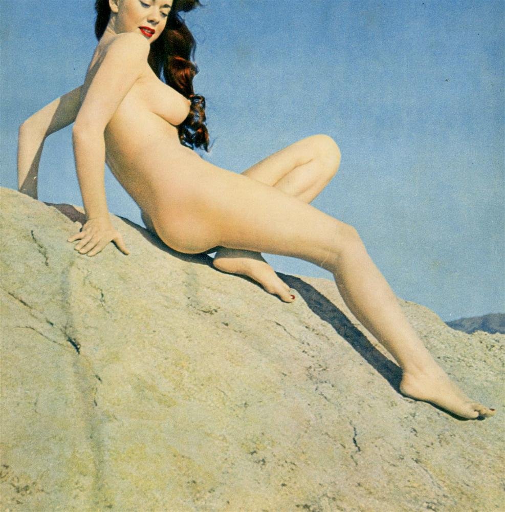 ANDRE DE DIENES - Original vintage color photograv: Andre de Dienes (Romanian/American, 1913 - 1985). "Rock Climbing Nude". Original vintage color photogravure. c1950. Printed c1950. Image size: 9 1/8 x 9 in. (232 x 229 mm). [25485] {R100}