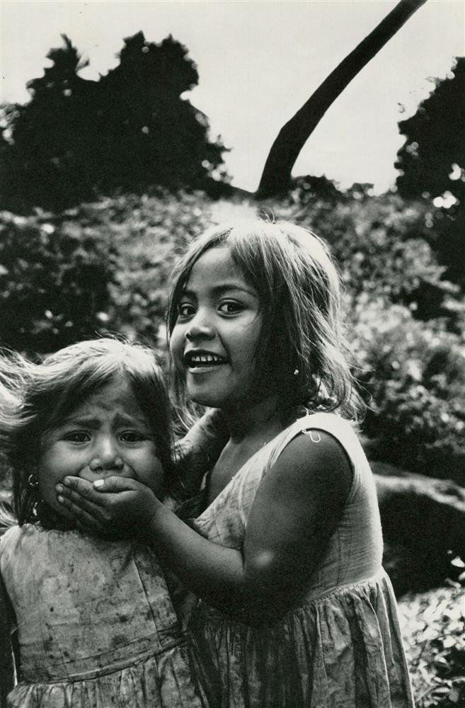 MARY ELLEN MARK - Original vintage photogravure: Mary Ellen Mark (American, b.1940). "Hush!". Original vintage photogravure. c.1967. Printed 1969. Fine condition. Image size: 13 x 8 3/4 in. (330 x 222 mm). [25460] {R100}
