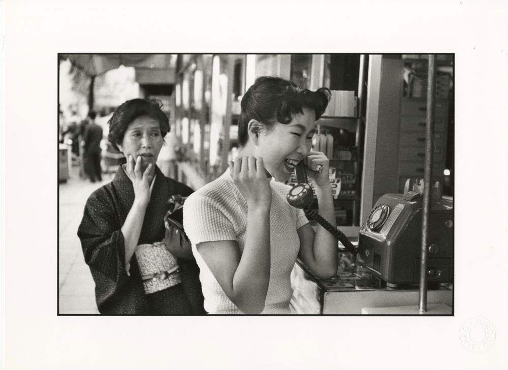 MARC RIBOUD - Original photolithograph: Marc Riboud (French, b.1923). "Tokyo, premiers telephones a pieces dans la rue". Original photolithograph. 1958. Printed 1998. Photographer's impressed blindstamp, lower right. Edition of 400 (of whic