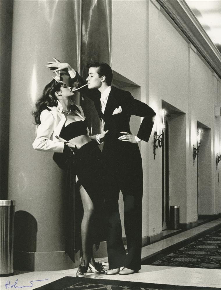 HELMUT NEWTON - Photolithograph: Helmut Newton (German/Australian, 1920-2004). "Woman into Man, French Vogue [Paris]". Photolithograph. 1979. Printed 1995. Signed "Helmut" in pen, lower left. Fine, quality printing. Very good conditi
