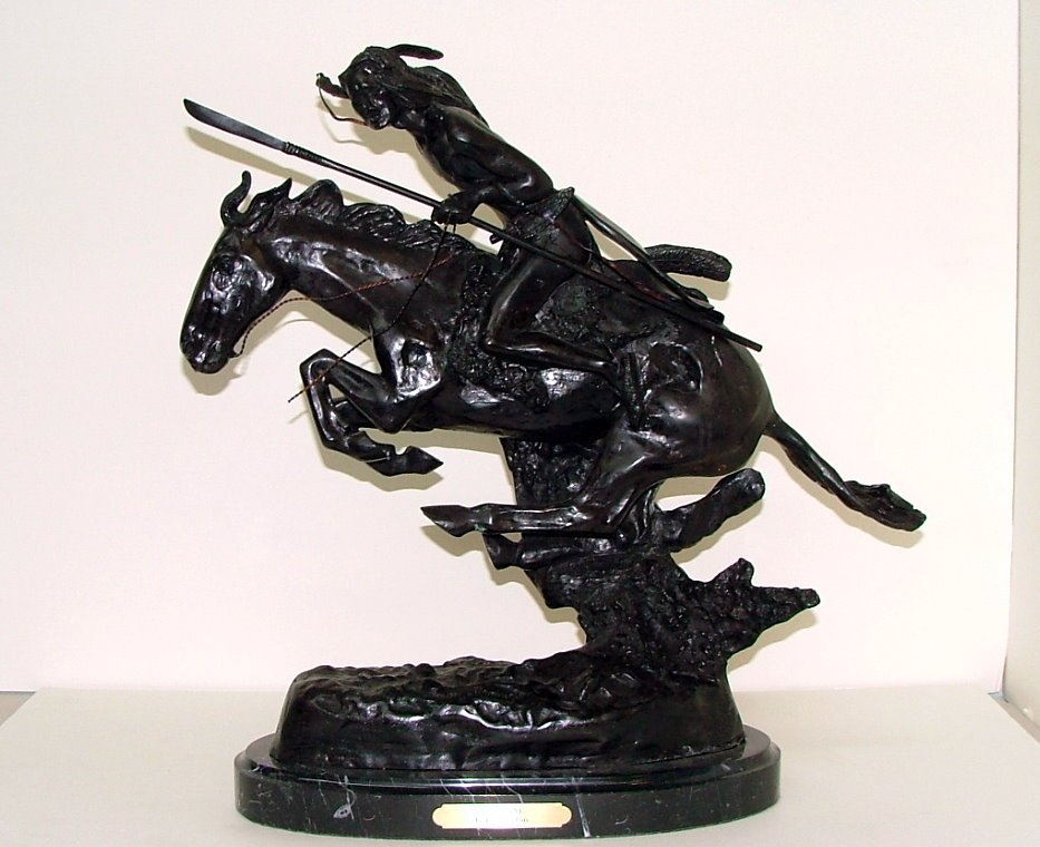 FREDERIC REMINGTON [after] - Bronze sculpture: Frederic Remington [after] (American, 1861-1909). "The Cheyenne". Bronze sculpture. 1901. Signed at the base of the sculpture. Very good casting. Very good condition; the polished marble plinth in goo