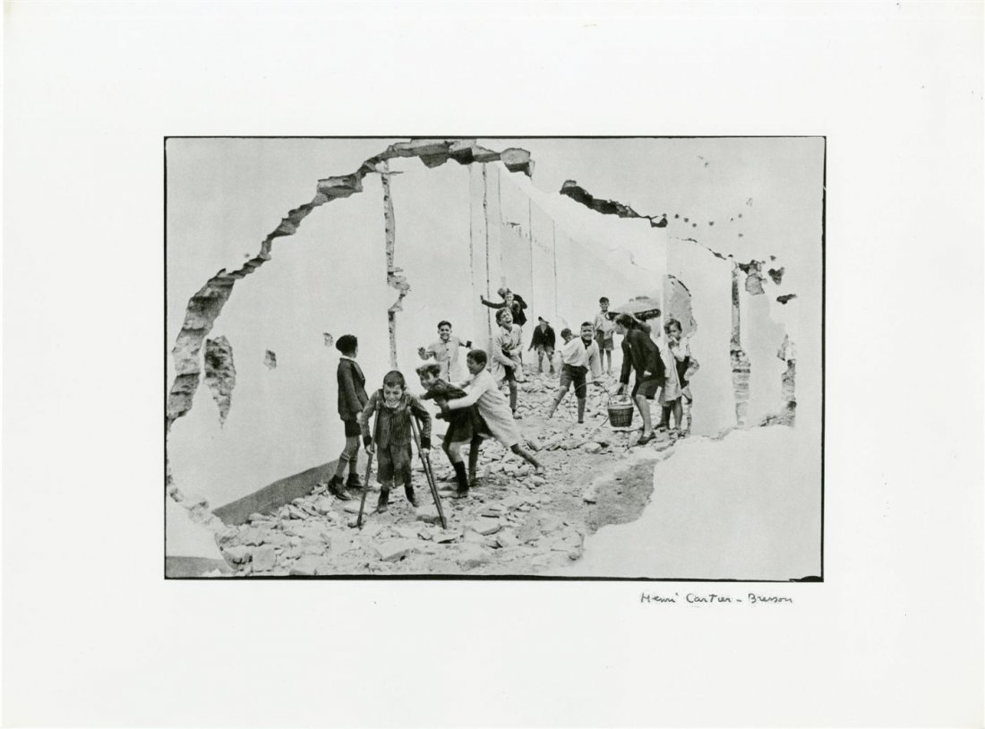 HENRI CARTIER-BRESSON - Original photogravure: Henri Cartier-Bresson (French, 1908 - 2004). "Seville, Spain". Original photogravure. 1933. Printed 1979. Stamped lower right. Fine, quality printing. Fine condition. Provenance: Private collector, Li