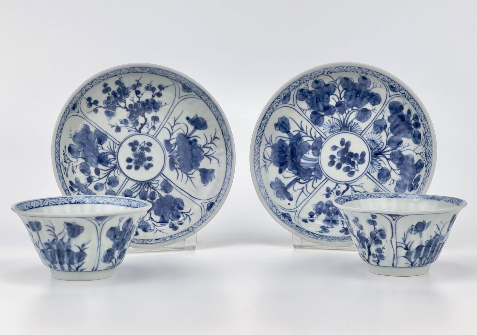 Blue And White Flower Pattern Tea Set, Qing Dynasty, Kangxi Era: The teabowl and saucer set depicts flower elements. In particular, this set is relatively larger than other teacups set. And the crafting skill of setting each line is outstanding. There is a kangxi m