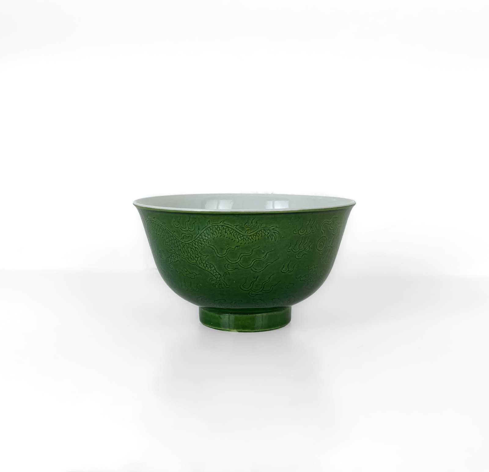 A CHINESE INCISED GREEN-GROUND DRAGON BOWL, DAOGUANG SEAL MARK AND OF THE PERIOD (1 of 1)