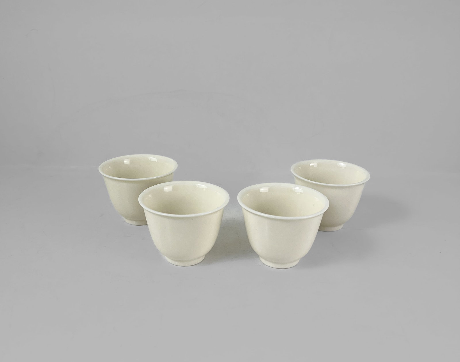 FOUR CHINESE BLANC DE CHINE TEA CUPS, 17TH C: FOUR CHINESE BLANC DE CHINE TEA CUPS, 17TH CENTURY. EACH CUP 5.5 CM DIAM, 4.5 CM HIGH GOOD CONDITION For reference see: The Pavilion sale - Chinese ceramics and works of art at Christie?s (4 OCT 2018,