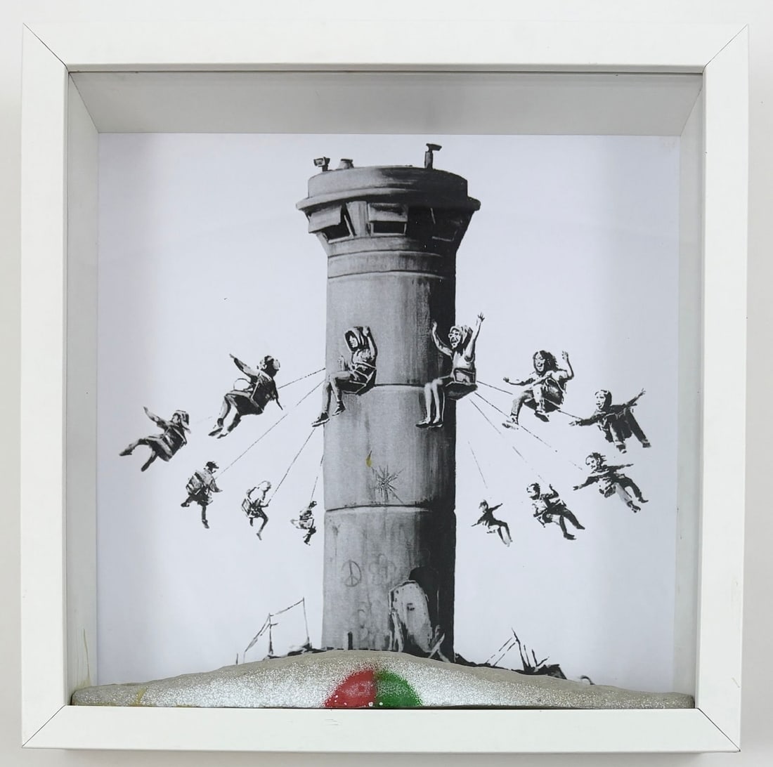 Banksy - Walled Off Hotel Box: BANKSY Walled Off Hotel Box This intriguing piece by the elusive street artist Banksy, titled *Walled Off Hotel Box*, draws inspiration from his politically charged and provocative works. Known for hi