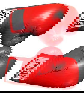 Muhammad Ali - Hand Signed, Pair of Boxing Gloves (Authenticated): MUHAMMAD ALI (1942–2016) Signed Pair of Boxing Gloves Hand signed by Muhammad Ali Authenticated by Steiner Sports An iconic piece of sports history — a pair of boxing gloves hand signed by “The