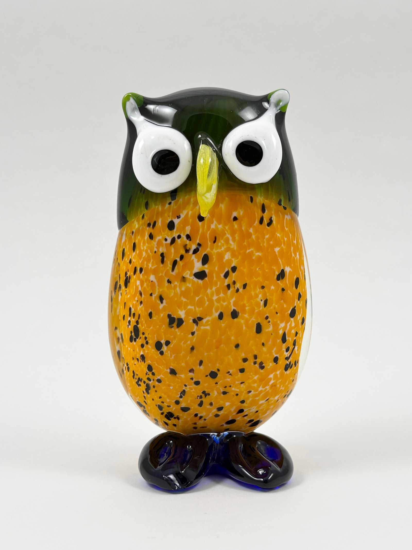 Murano Art Glass Owl Sculpture, 6 Inches Tall: MURANO Art Glass Owl Hand-blown in the traditional Murano style, this vibrant owl sculpture features a striking mix of orange, black, green, and white glass. Characterized by its expressive eyes and r