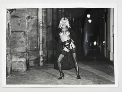 Helmut Newton - Nude in Paris, 1985 (Silver Gelatin): HELMUT NEWTON (1920–2004) Nude in Paris, 1985 Silver gelatin print Hand signed and dated in pencil, lower right An evocative small-format photograph by Helmut Newton, featuring one of his signature