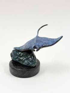 Robert Wyland Sea Ray Signed Bronze Sculpture, 1992, Edition of 950: ROBERT WYLAND (B. 1956) Sea Ray, 1992 Signed and numbered bronze sculpture from the limited edition of 950. This finely cast piece captures the fluid motion of a sea ray gliding through the water, ren